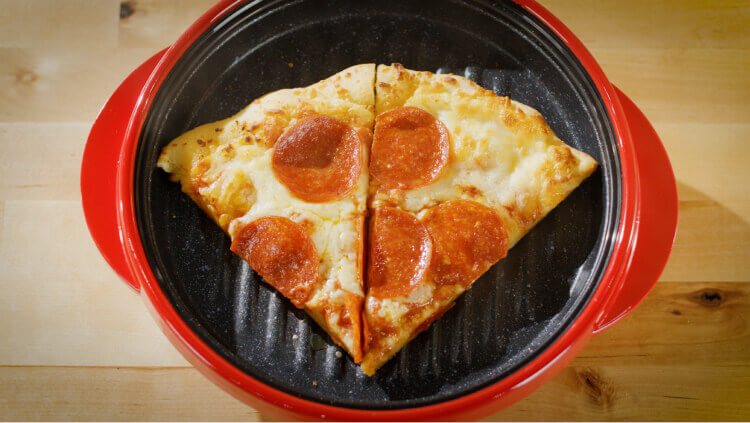 Slice of pepperoni pizza crisping on the Turbo Grill